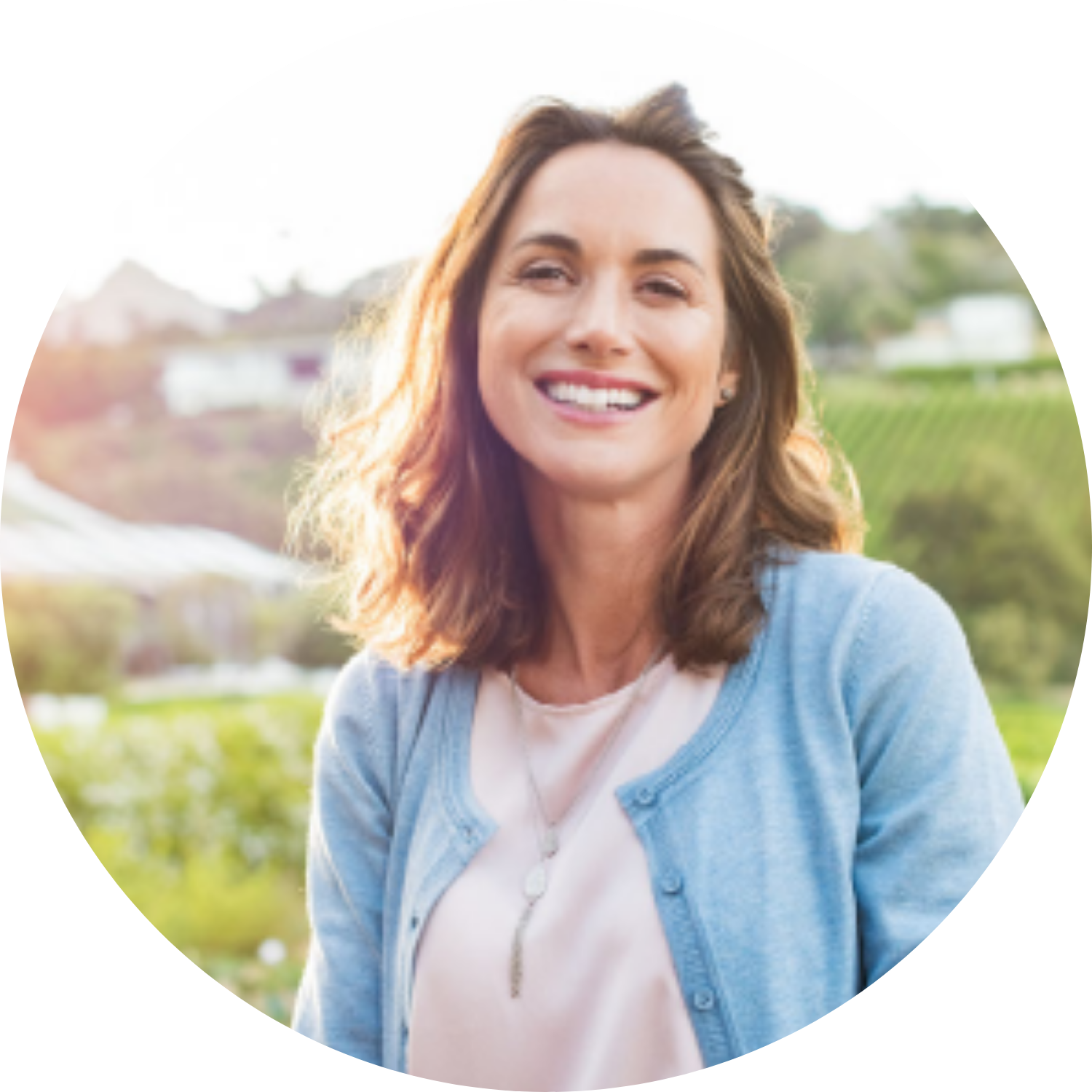 Woman sitting on rocks at the beach